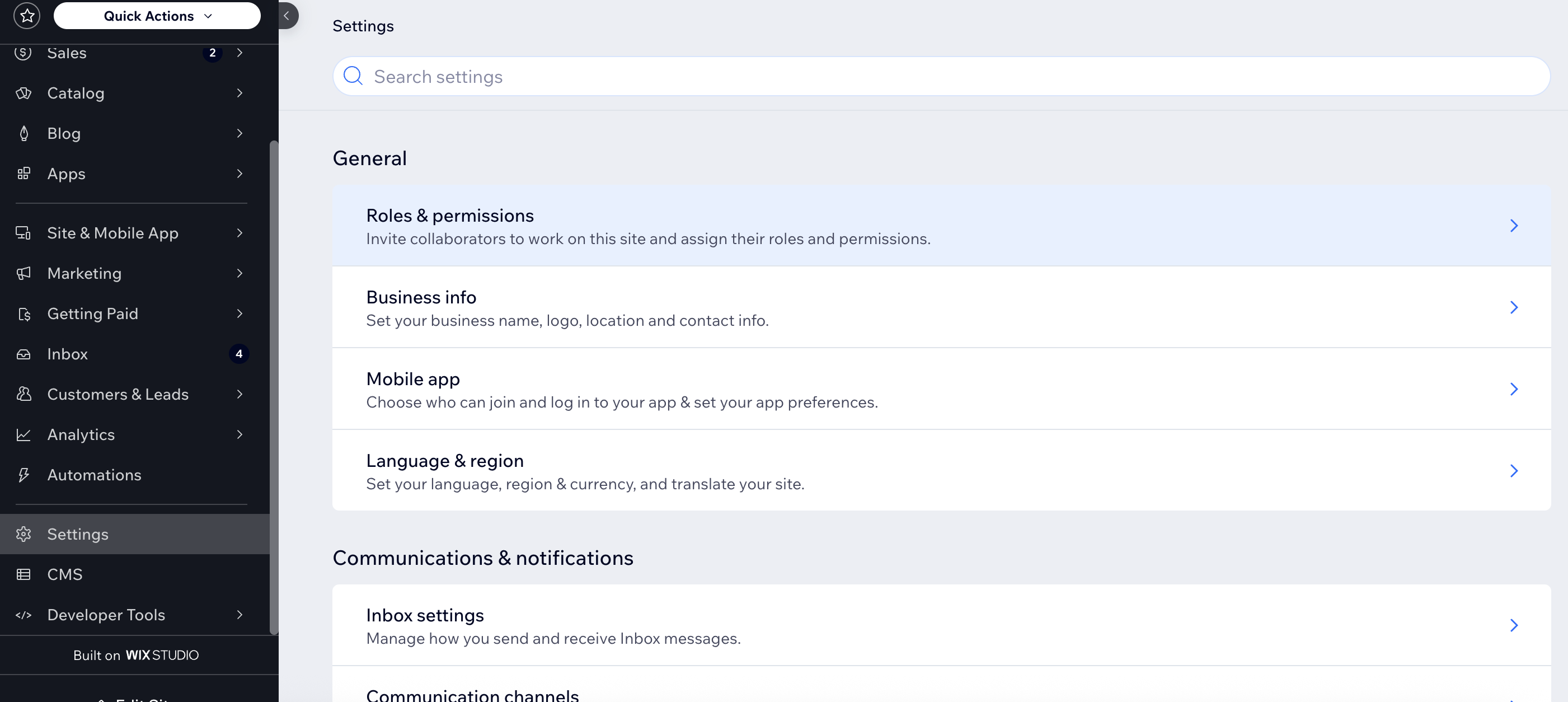 Wix Settings-siden med Roles & Permissions markert